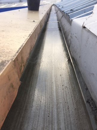 Close-up of a clean industrial roof gutter channel